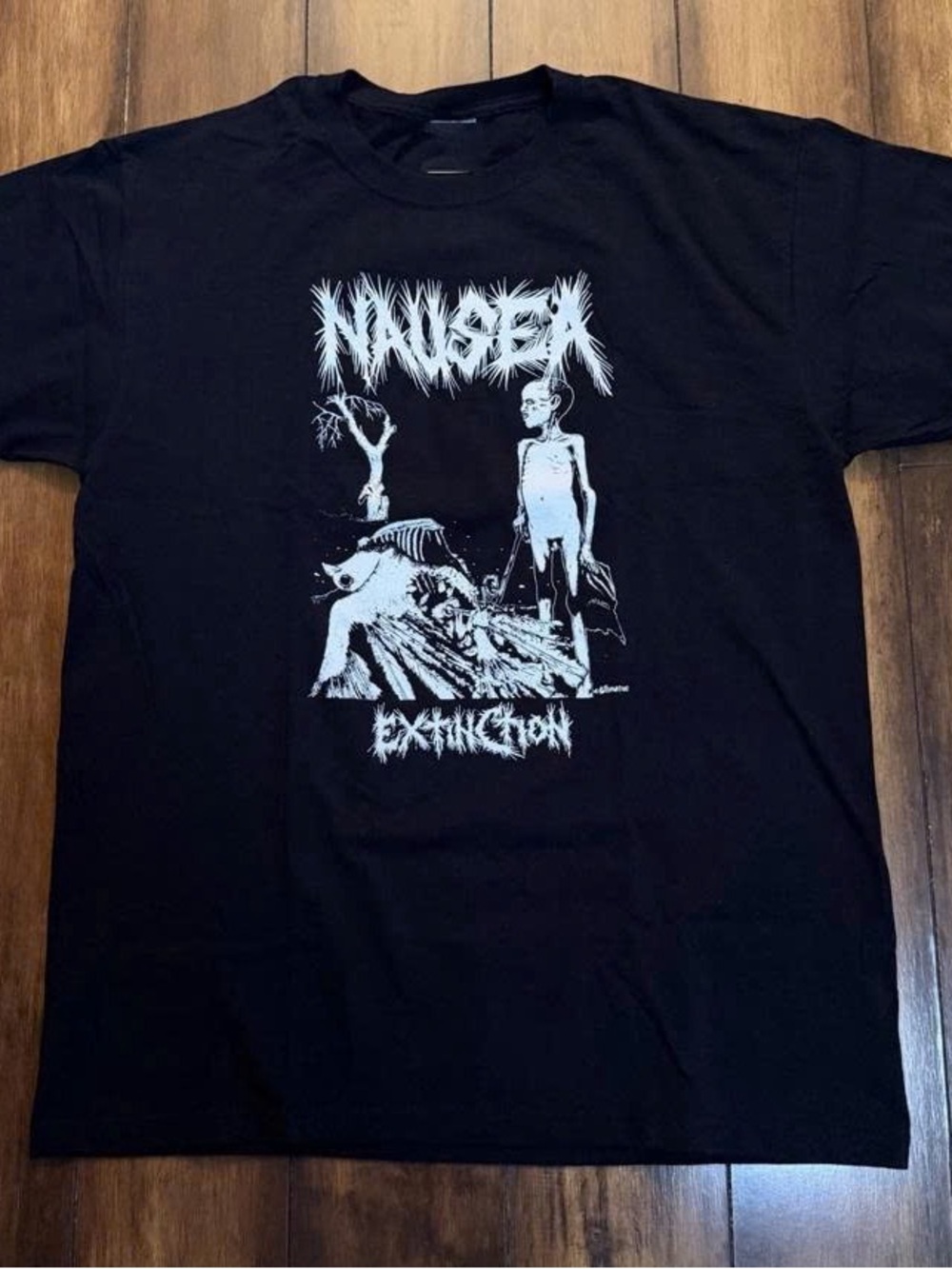 T-Shirt with White 'Nausea Extinction' Graphic